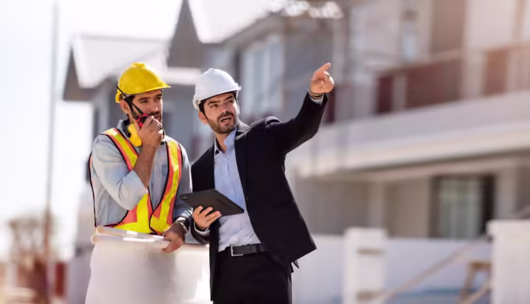 civil-engineer-construction-architecture-worker-are-working-construction-site-with-tablet-blueprints-planing-about-new-construction-sitecooperation-teamwork-concept_640221-306